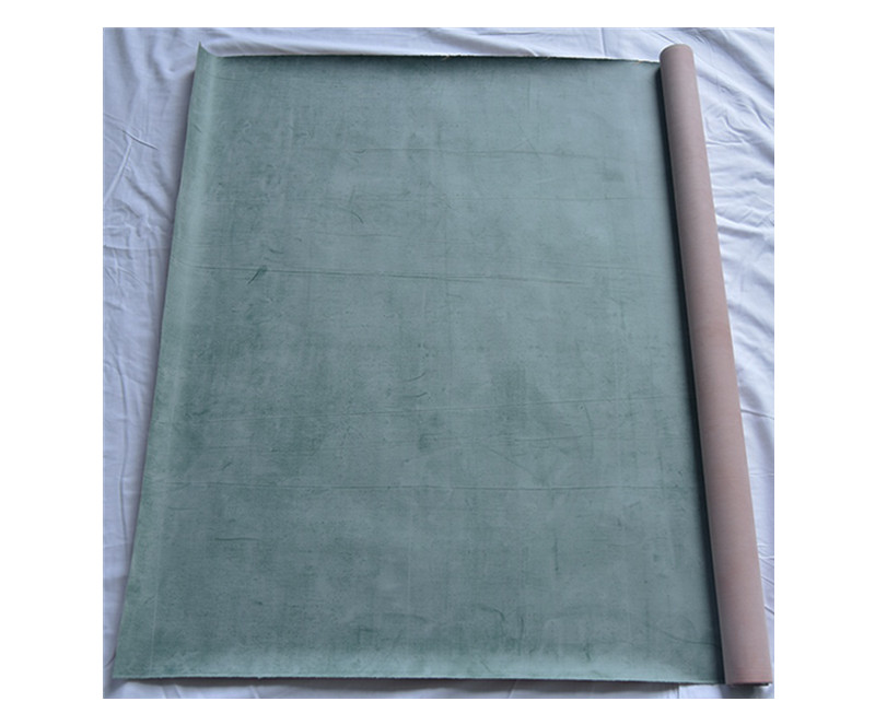 Green hospital mackintosh rubber bed sheet